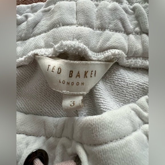 Aritzia White Joggers with Pink Floral Accent - Picture 3 of 3